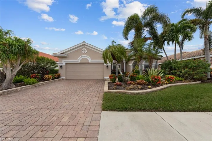 Long brick drive, brick edging around landscaping