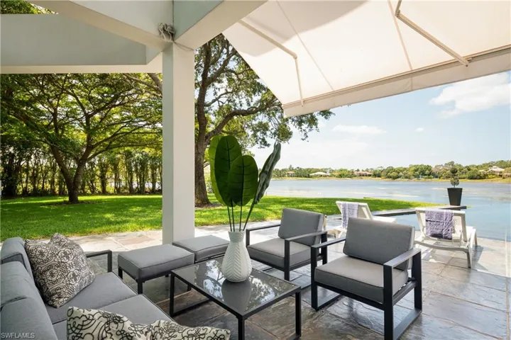 View of patio / terrace featuring a water view