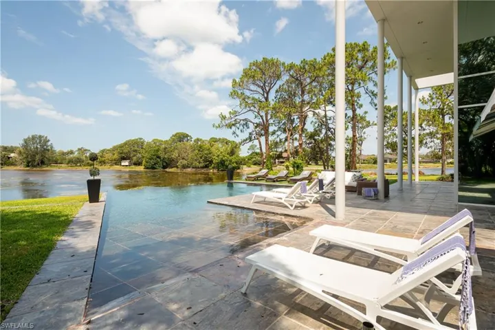 View of patio featuring a water view