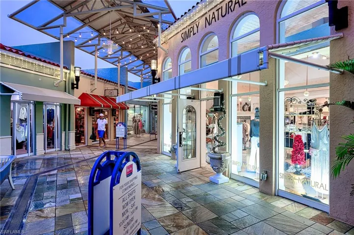 the shops and restaurants of Venetian Village across the boulevard from Surfsedge