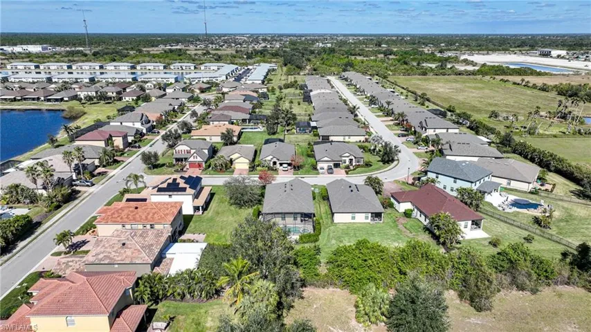 Drone / aerial view featuring a residential view and a water view