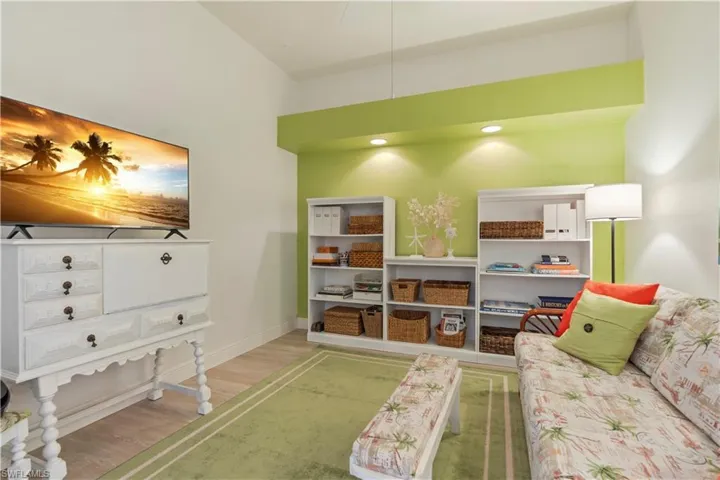 Living room with light wood-type flooring