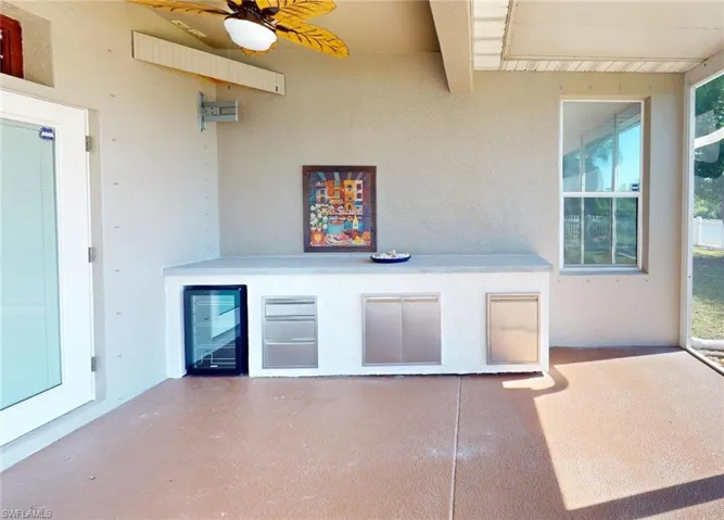 View of terrace featuring ceiling fan
