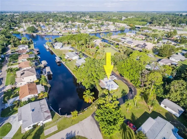 Aerial view of residential area with a large body of water