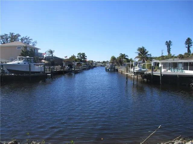 Water view with a boat dock