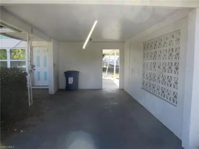 View of patio featuring a carport