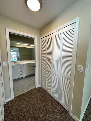 Showing one of two large walk in closets