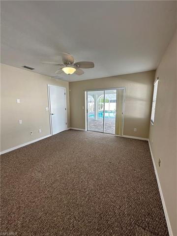 Master Bedroom showing sliding doors going to pool