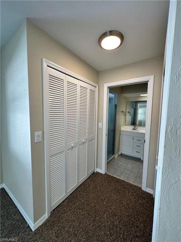 Showing one of two large walk in closets
