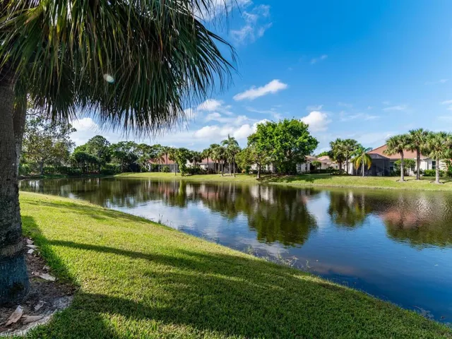 View of water feature behind home
