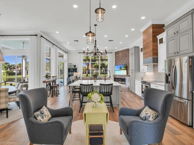 Open concept living with spectacular kitchen, harwoods, fireplace and so much more! Windows and natural light galore.