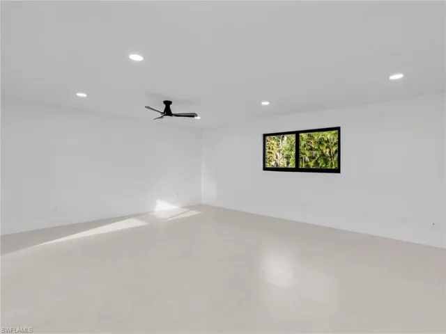 Unfurnished room with recessed lighting and a ceiling fan