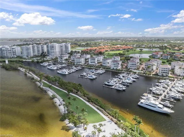 Bird's eye view of a nearby body of water and a marina