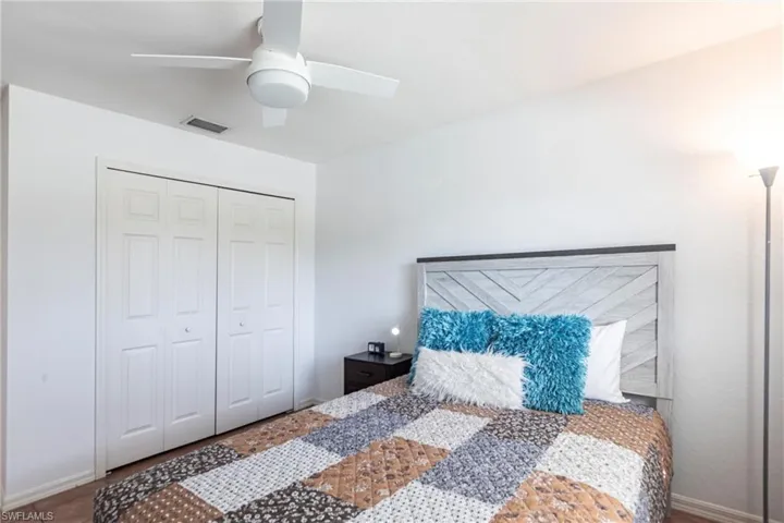 Bedroom with a closet and ceiling fan