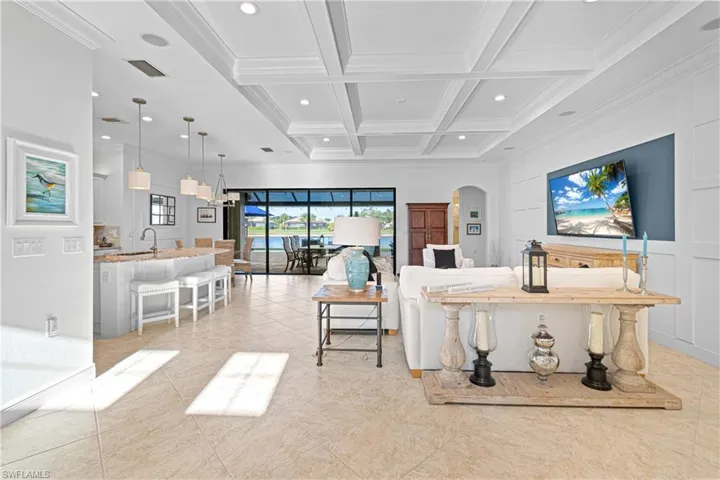 NOTE ALL THE ADDED DETAILS WITH THIS ESTATE HOME LIKE THE CUSTOM CEILING WOODWORK, LARGE 20” TILE FLOORING ON THE DIAGONAL & THE 75” T.V. STAYS! WHAT ANOTHER GREAT VALUE FOR YOU TO ENJOY!