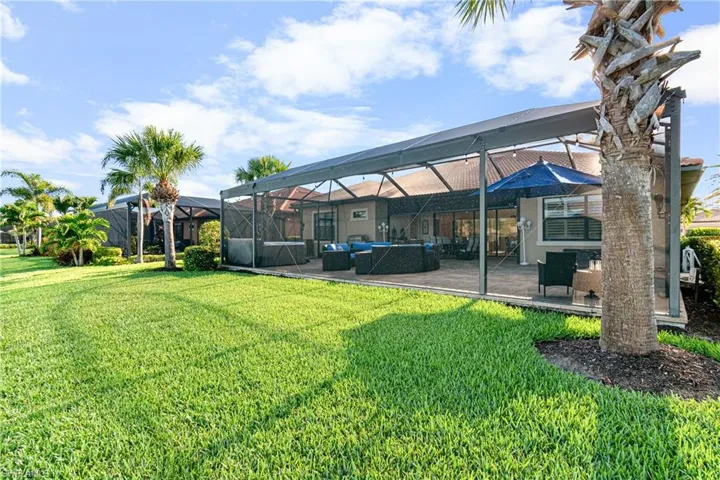 GREAT SIDE VIEW OF THE PROPERTY  STILL AVAILABLE TO INSTALL A POOL IF YOU WISH.