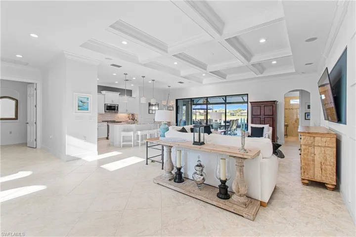 12 FT. HIGH TRAY CEILING WITH 7 1/2” CROWN MOLDING THROUGHOUT PLUS CUSTOM WOODWORK & RECESSED LIGHTING W/DIMMER!
