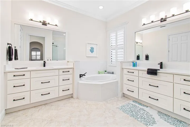 TOTALLY CUSTOM UPGRADE REMODELED MASTER BATHROOM IN 2023 WITH NEW CABINETS, FRAMELESS SHOWER, TUB, TILE, FAUCETS, HARDWARE, PAINT & EXHAUST FAN TIMER SWITCHES (2). SO BEAUTIFUL! MUST BE SEEN IN PERSON TO TRULY APPRECIATE!