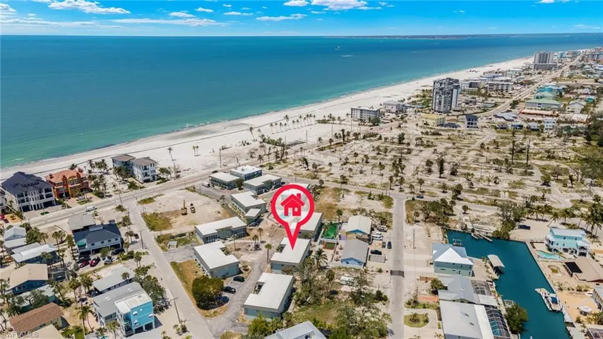 View of complex a few steps from Gulf with deeded entry