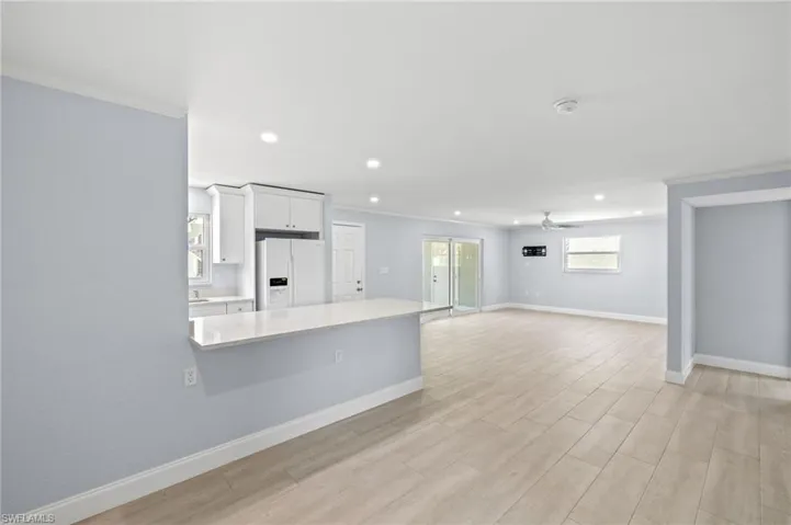 View from dining area towards breakfast bar and living room