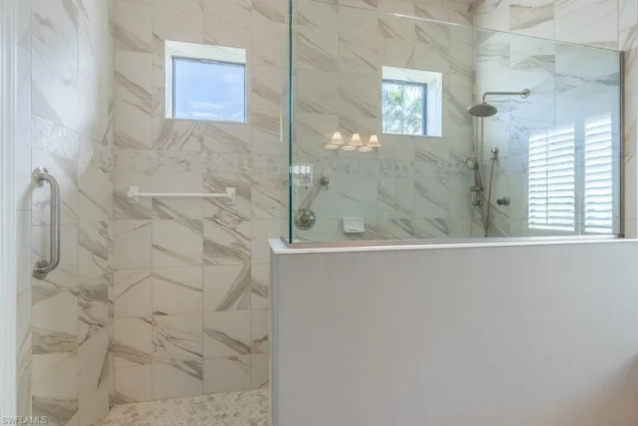 Bathroom with tiled shower