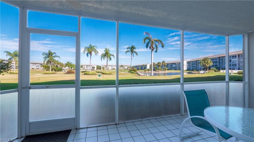 E X P A N S I V E views of the golf course from your private lanai. Florida glass screens keep water and dirt at bay.