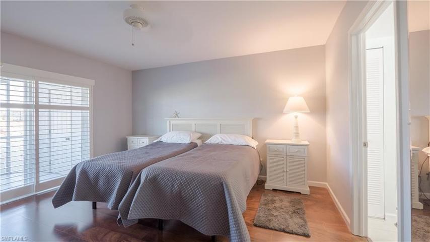 Master Bedroom  boasts a double slider w/CAT 5 glass that allows easy entry onto the lanai.