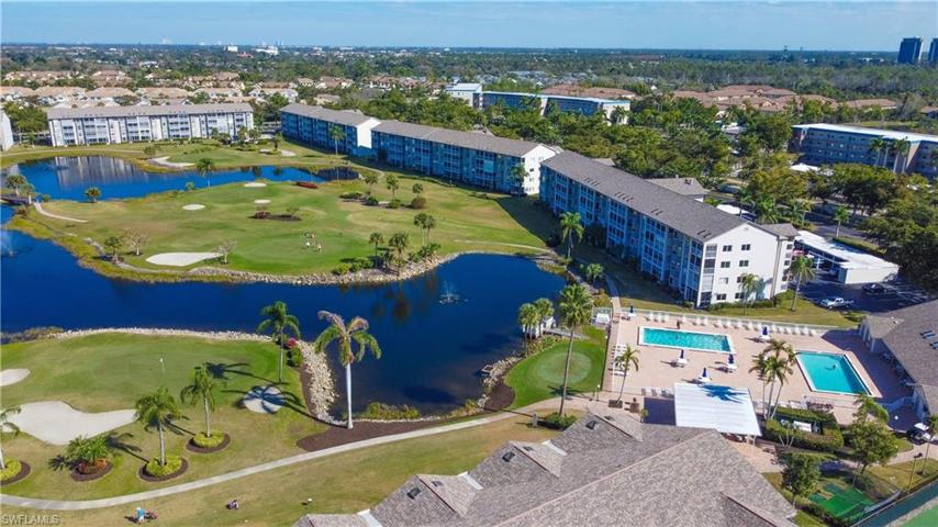 Birds eye view over St. Andrews showing the proximity to the clubhouse, pools, putting green, fishing pier, dining pavilion, driving cage and clubhouse.