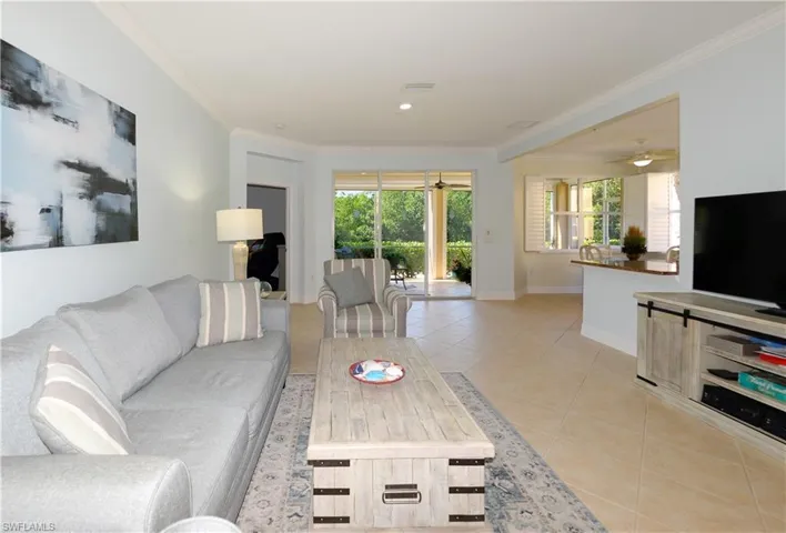 Bright & airy great room. Every detail has been attended to, offering peace of mind and the very essence of Florida living!