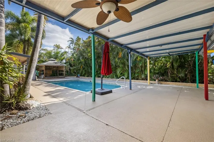 Spacious lanai overlooking pool.
