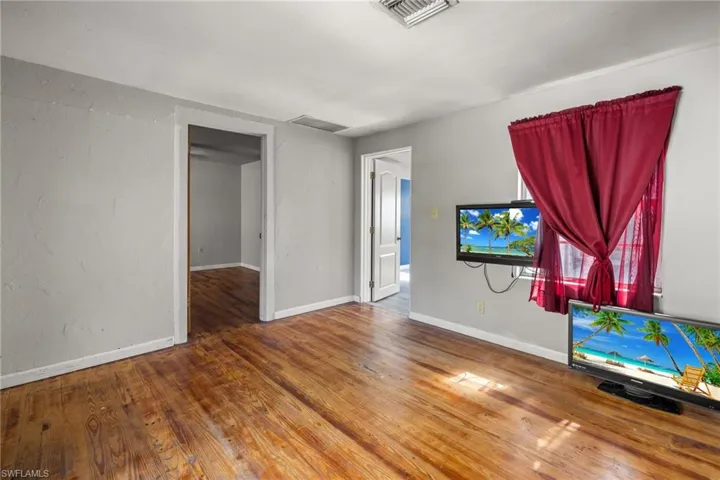 Living Room in the Guest Home-original wood floors.