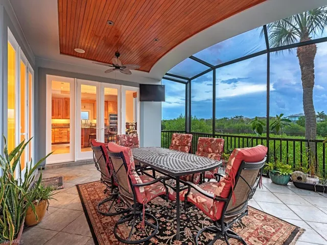 Screened in lanai with views of the pond and sunsets