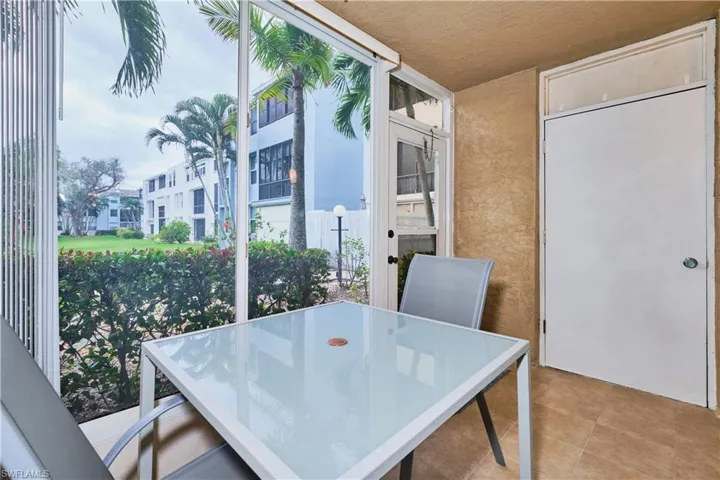 Enclosed Lanai With Peaceful Courtyard Views.