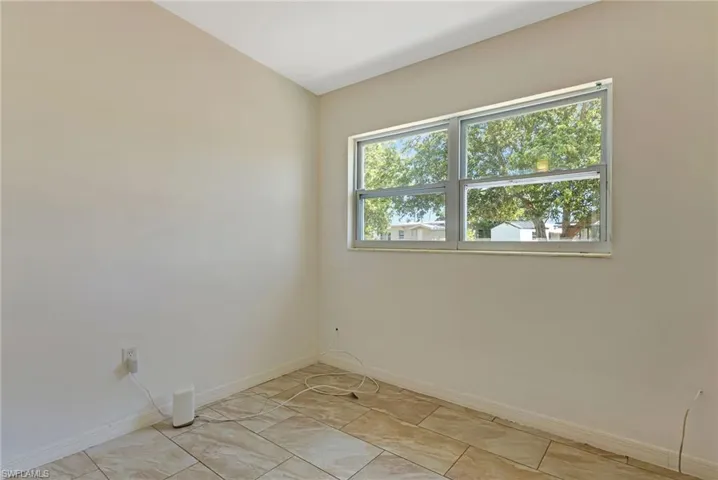 View of tiled empty room