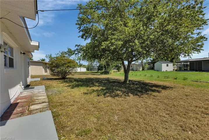 View of yard with a shed