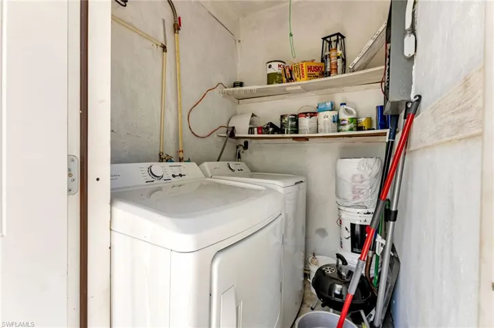 Washroom featuring separate washer and dryer