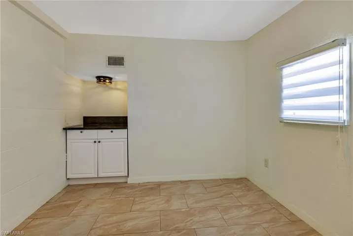 View of tiled empty room