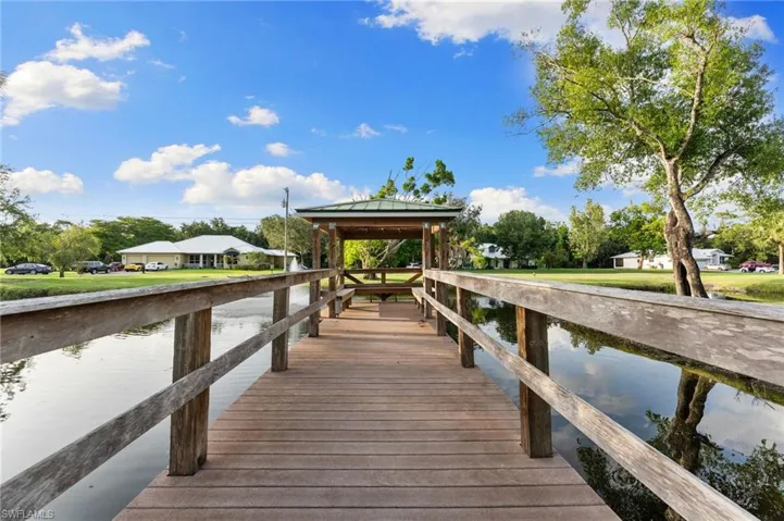 Dock area featuring a gazebo and a water view