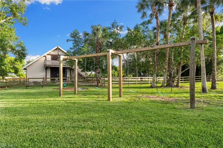 View of yard featuring a playground