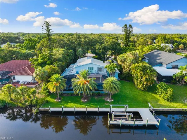 View of subject property with a nearby body of water
