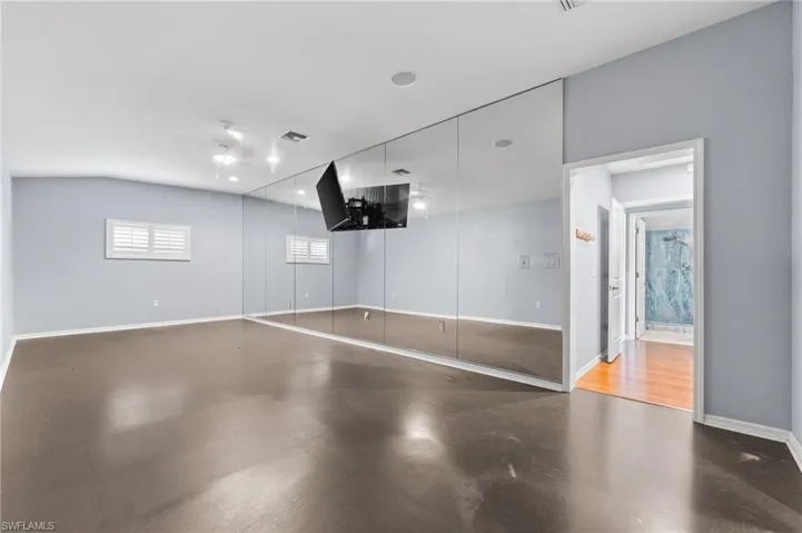 Garage featuring baseboards