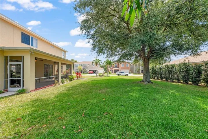 View of green lawn with plenty of room to put in a pool