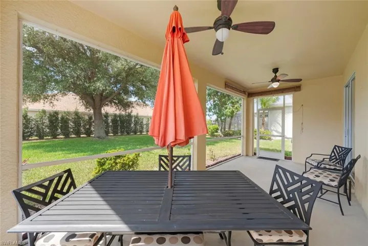 Covered and screened lanai with ceiling fans