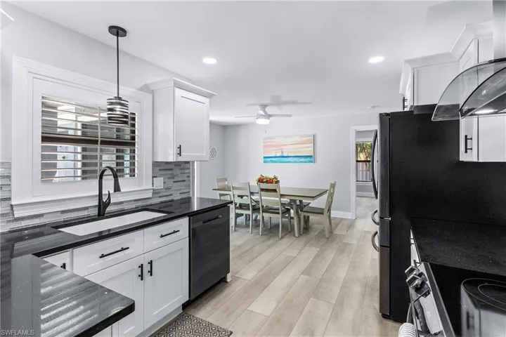 Partial View of Kitchen toward Casual Dining area.