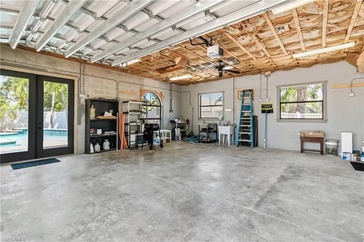 Air Conditioned Interior of the Detached Spacious Garage Adjacent to Courtyard.
