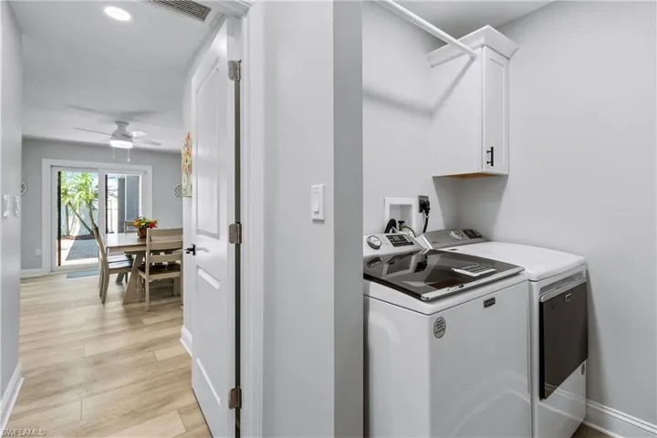 Convenient Separate Laundry Room.