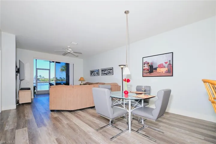 Dining room featuring ceiling fan and wood finished floors