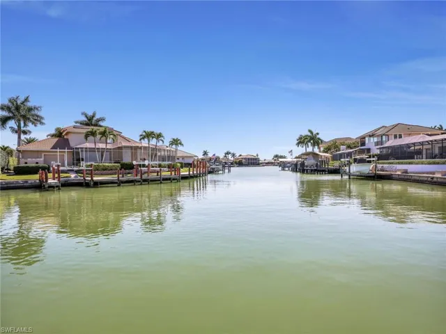 Dock area featuring a water view and a residential view