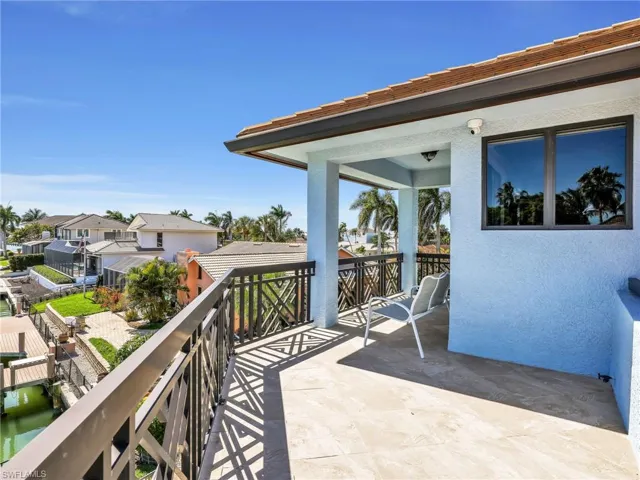 Balcony featuring a residential view
