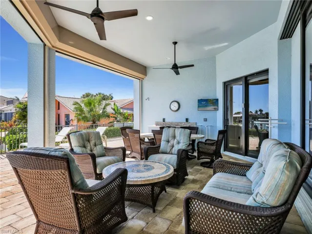View of patio / terrace featuring ceiling fan and an outdoor living space